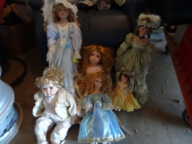 5 Porcelain Dolls and One Vintage Doll