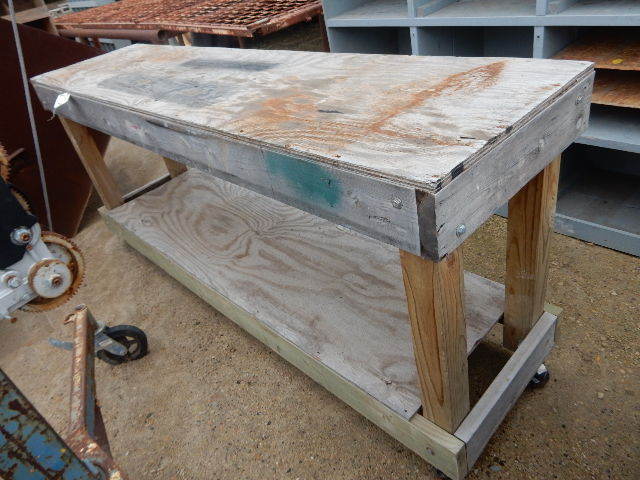 Heavy wood table on casters