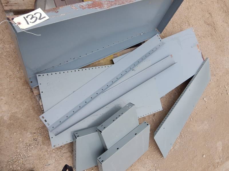 Metal Shelf in parts. This was in a box that was in bad shape.. Should all be there