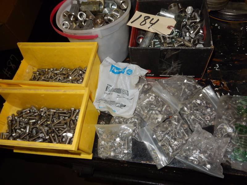 Misc. nuts and bolts as pictured. Look at the closeups to learn more of wha tis in the lot. Includes a 5 quart pail of Threaded Rod nuts