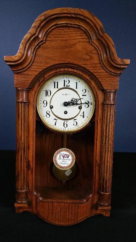 lot 11 image: Howard Miller Wind-up Oak Mantle Clock
