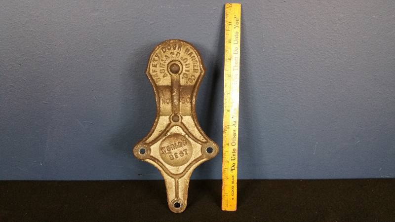 lot 29 image: Antique Safe Door Hanger Co. Barn Door Hanger