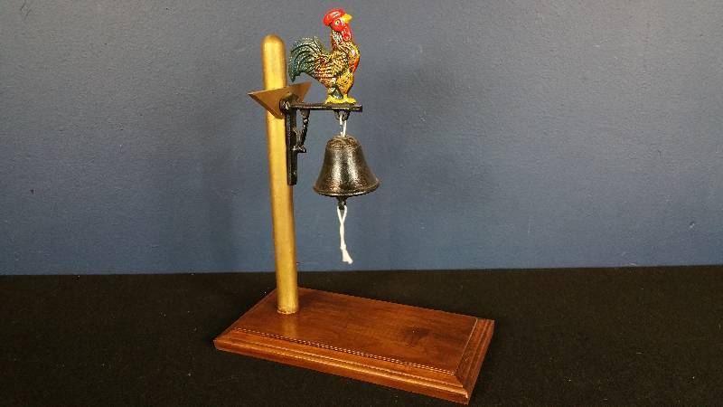 lot 84 image: Cast Iron Rooster Brace with Bell