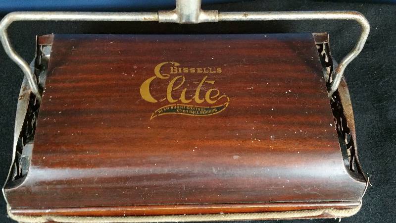 lot 134 image: Antique Bissells Elite Wood Push Vacuum