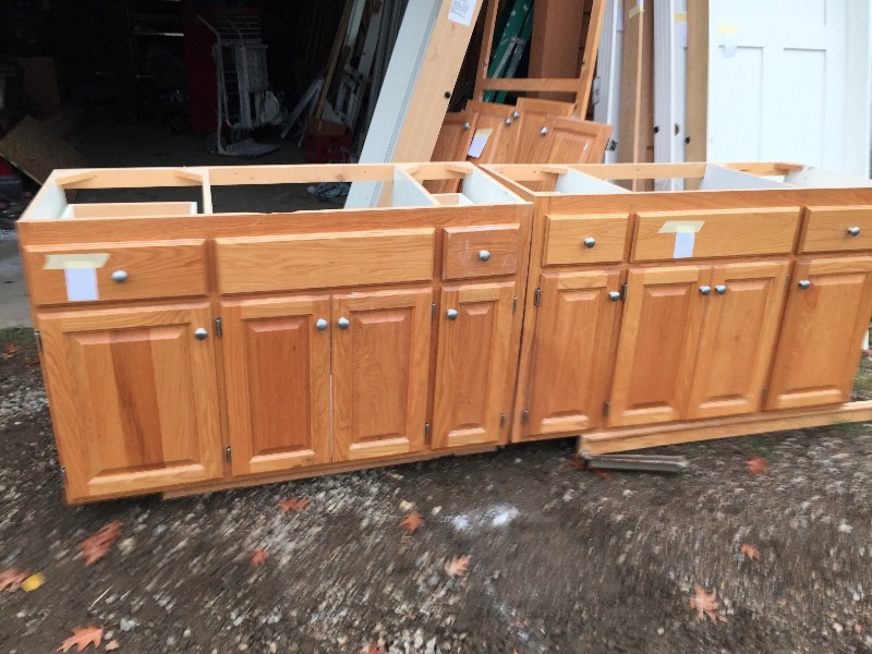 lot 13 image: Solid Oak raised panel double cabinets, set of 2, used