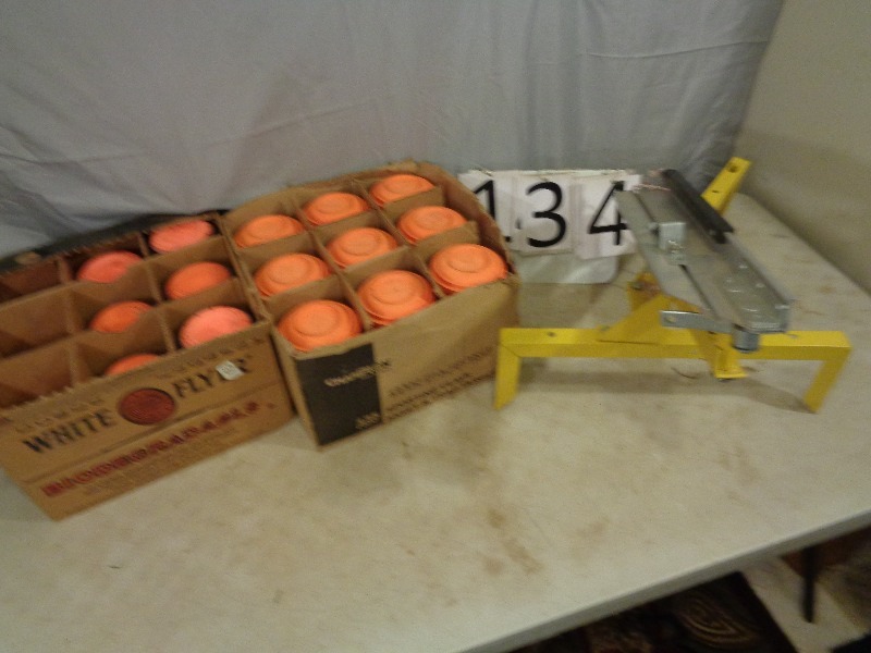 lot 134 image: Clay Pigeon Targets and Thrower