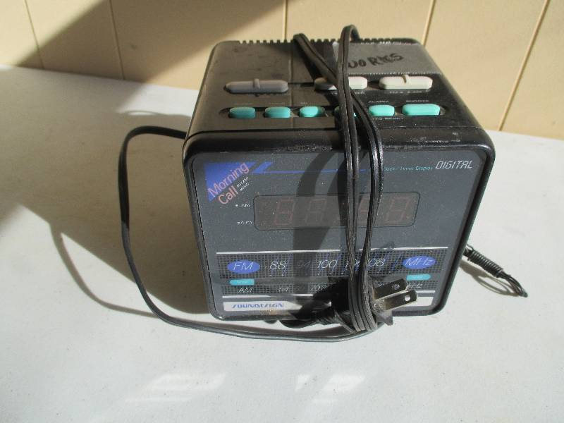 Digital alarm clock and radio, work...