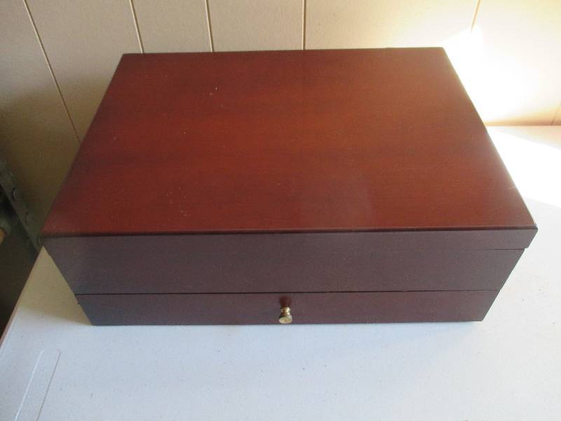 Wooden plush lined silverware chest...