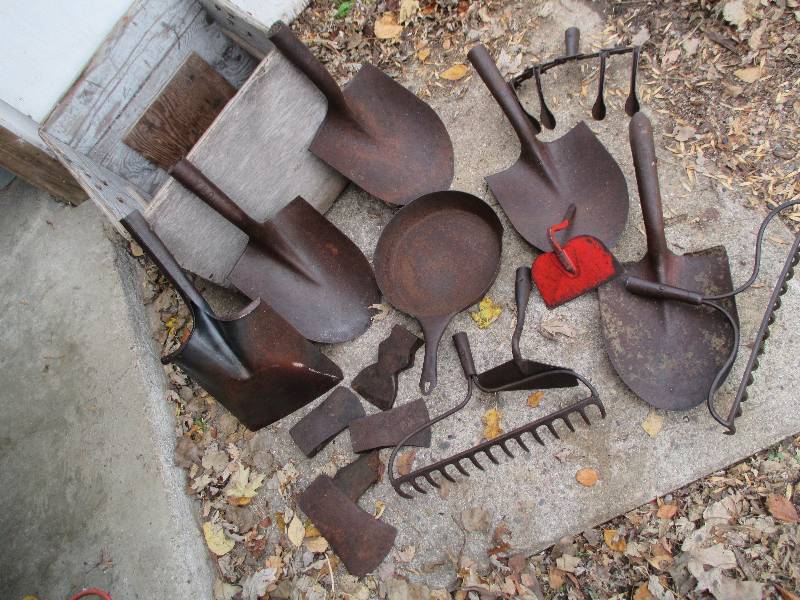 lot 82 image: Wood box filled with old iron tools...