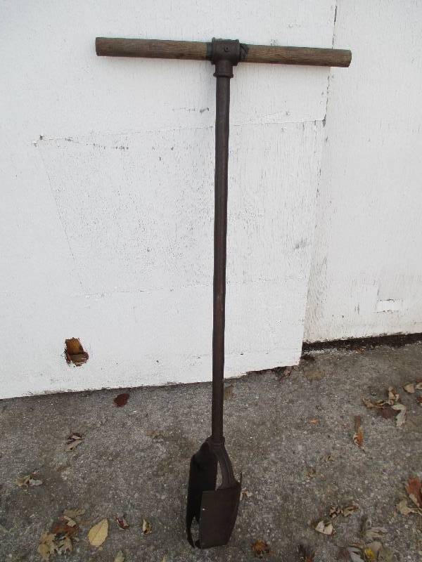 lot 89 image: post hole digger...