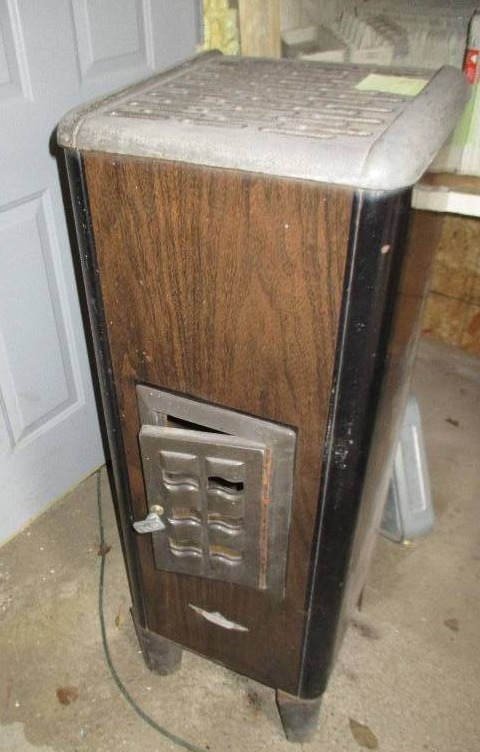 lot 95 image: Kerosene heat stove, 44 tall, ODIN...