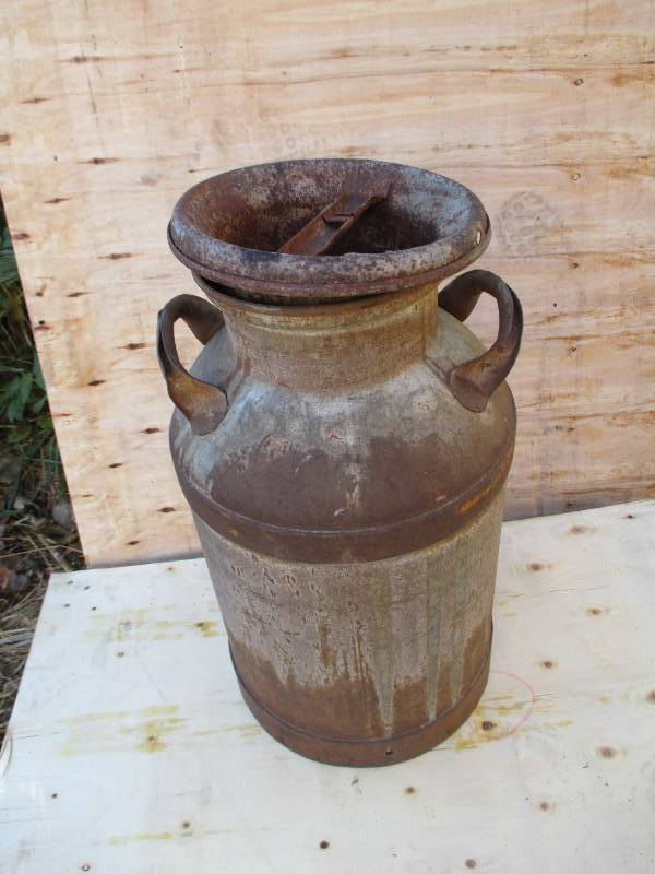 lot 1 image: Antique milk can, with lid...