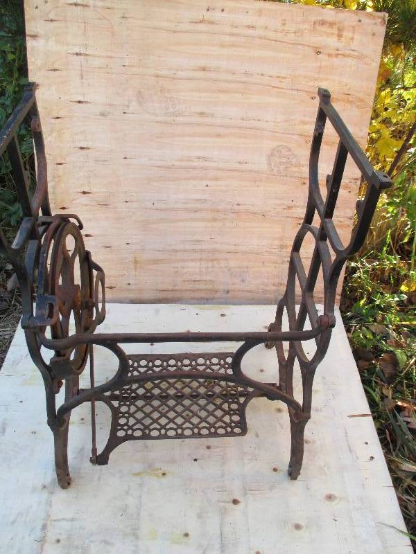 lot 18 image: all metal antique sewing machine wi...