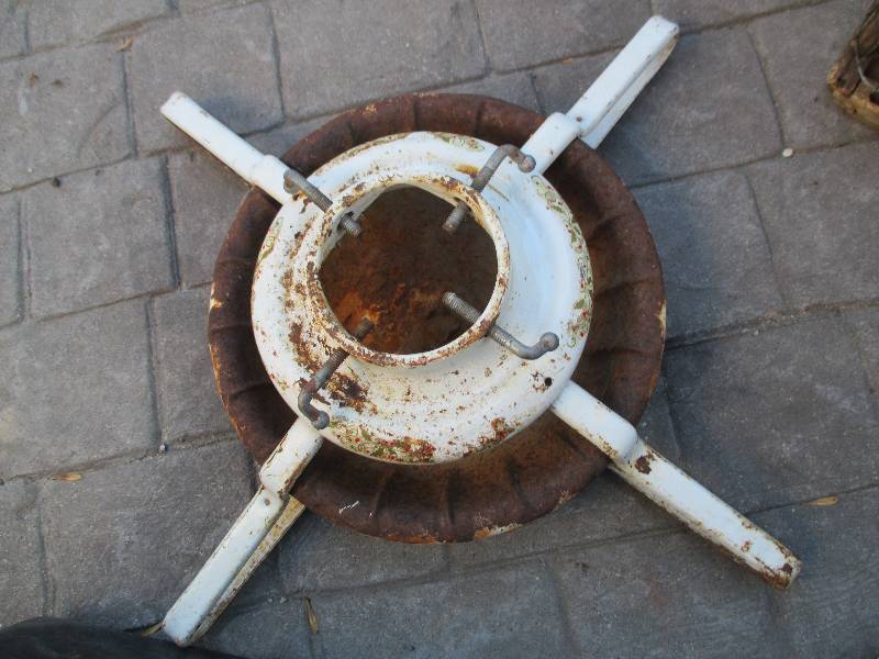 lot 49 image: antique metal chrisdtmas tree stand...