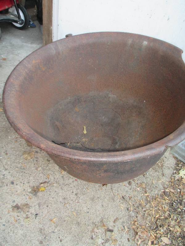 lot 66 image: solid cast iron pot- 33 across, 1...