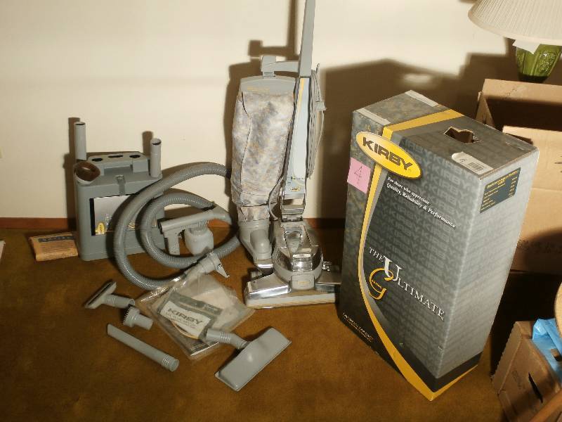 Kirby vacuum with attachments includes box and paperwork