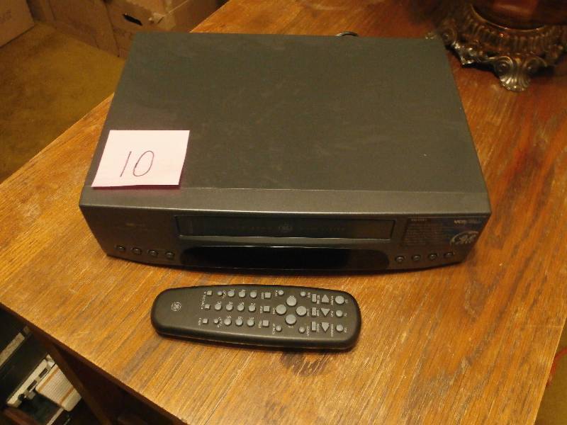 G.E. VHS movie player with remote (nearly new)