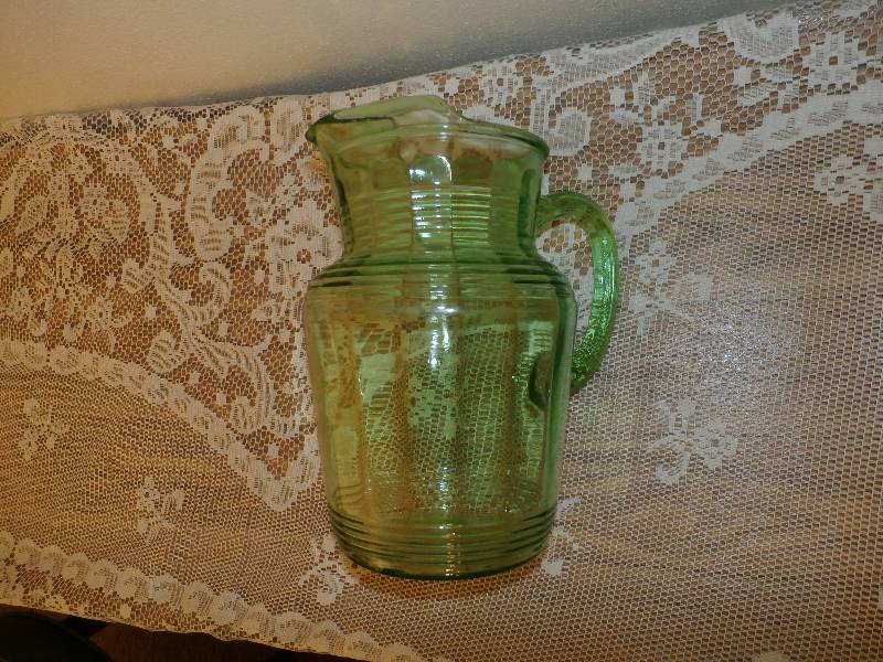 Collectible green glass pitcher