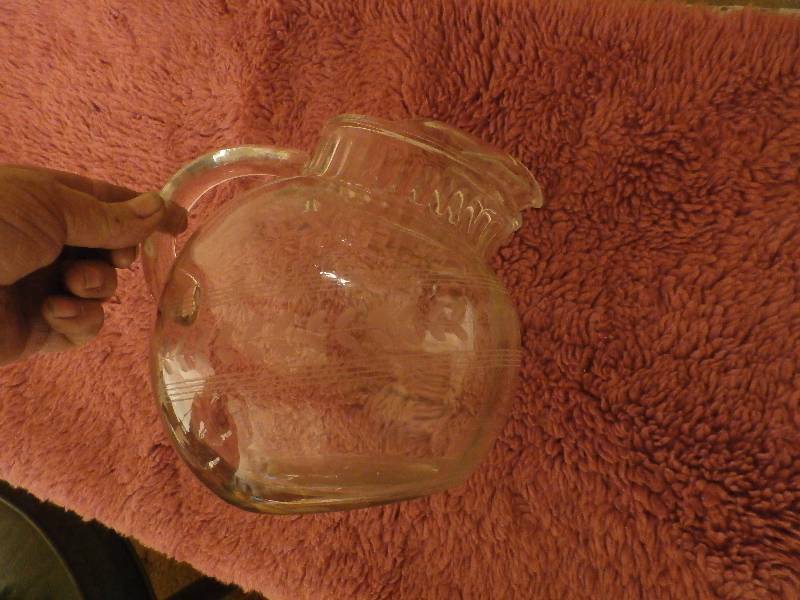 Collectible clear etched glass pitcher