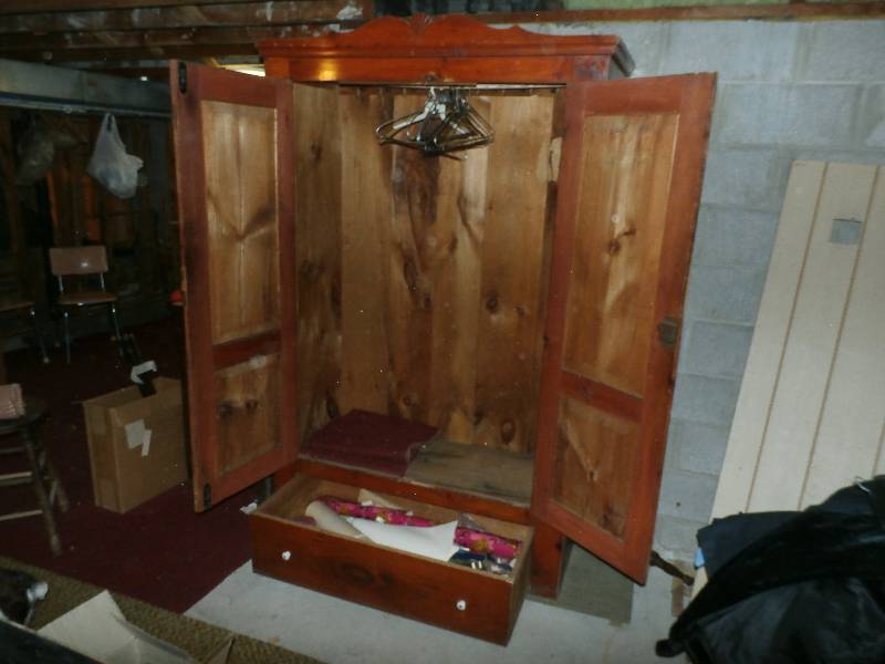 Antique wood wardrobe.