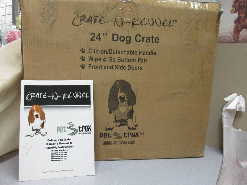 24 inch metal dog kennel. Used once...