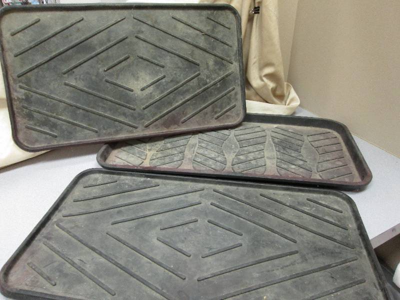 3 shoe mats with raised edges...