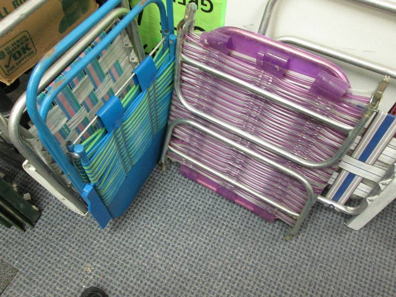 4 lawn chairs. both ends of the lon...