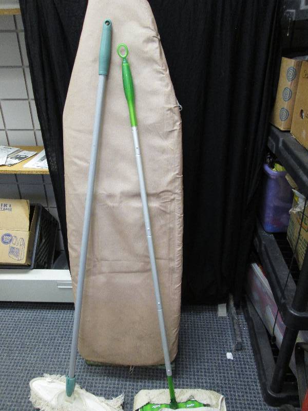 2 dust mops and 1 ironing board...