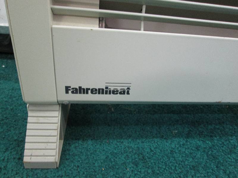 oil space heater roughly 5 feet lon...