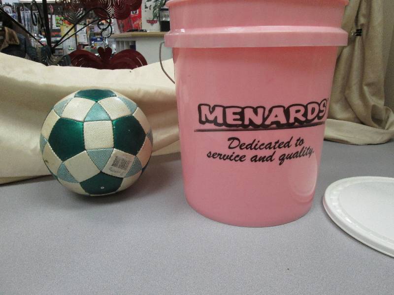 Soccer ball with green coloring and...