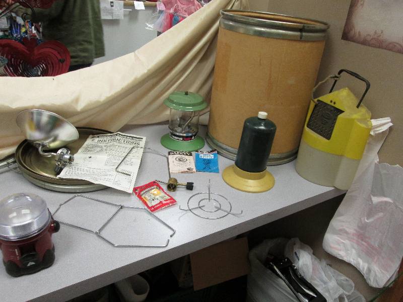 barrel of misc camping supplies all...