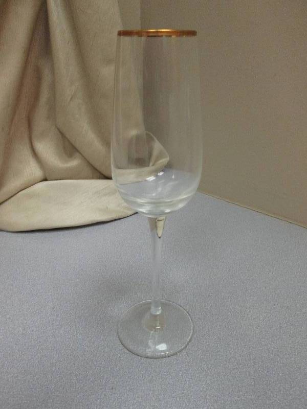 set of eight identical wine glasses...