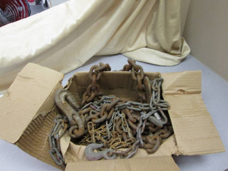 box of tow chains of different size...