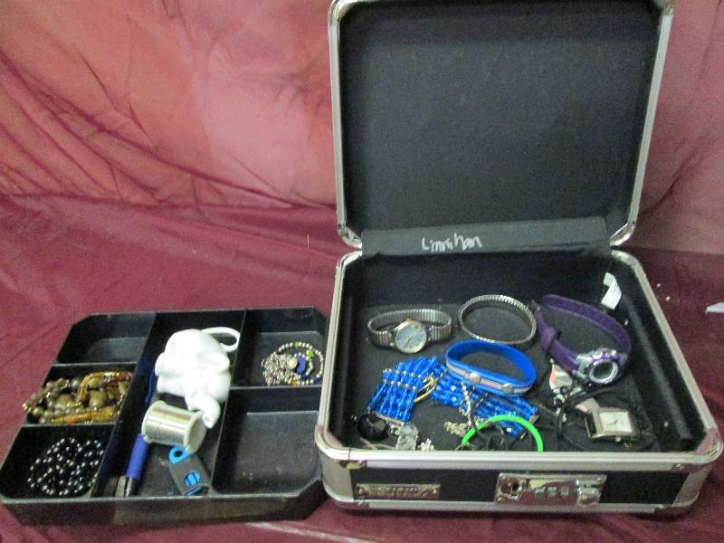 Hard silver case, with assorted mix...