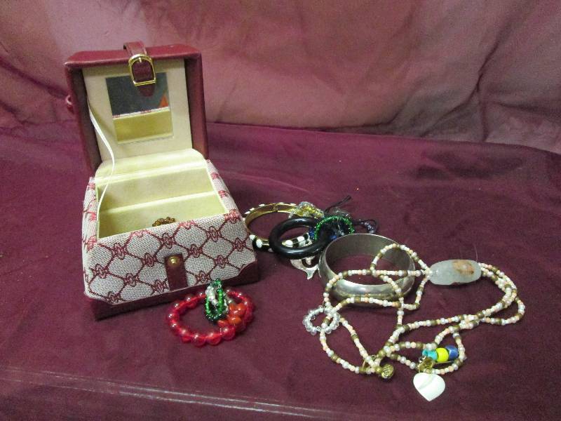 Small burgandy jewelry box with ass...