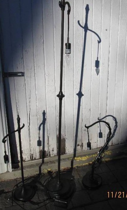 3 metal frame lamps, the tallest on...