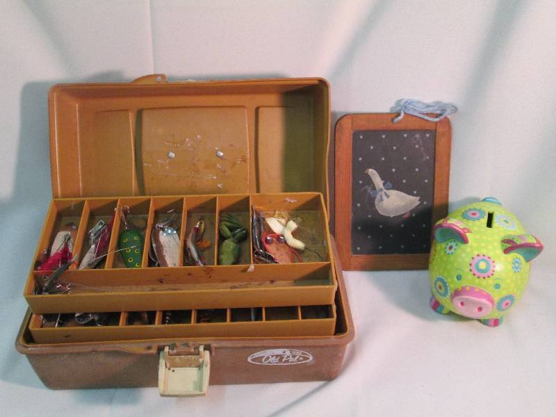tackle box filled with tackle, pigg...