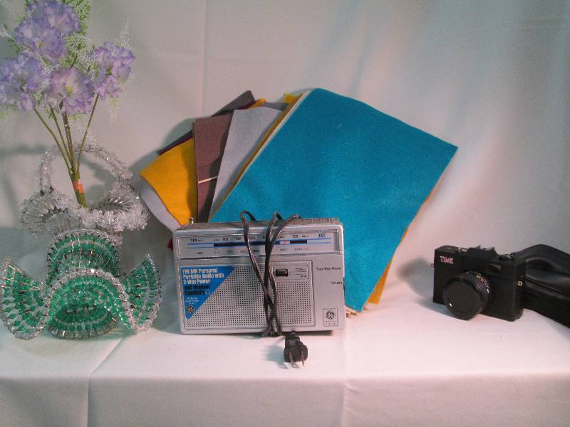 time camera,x2 radios,x2bead vases,...