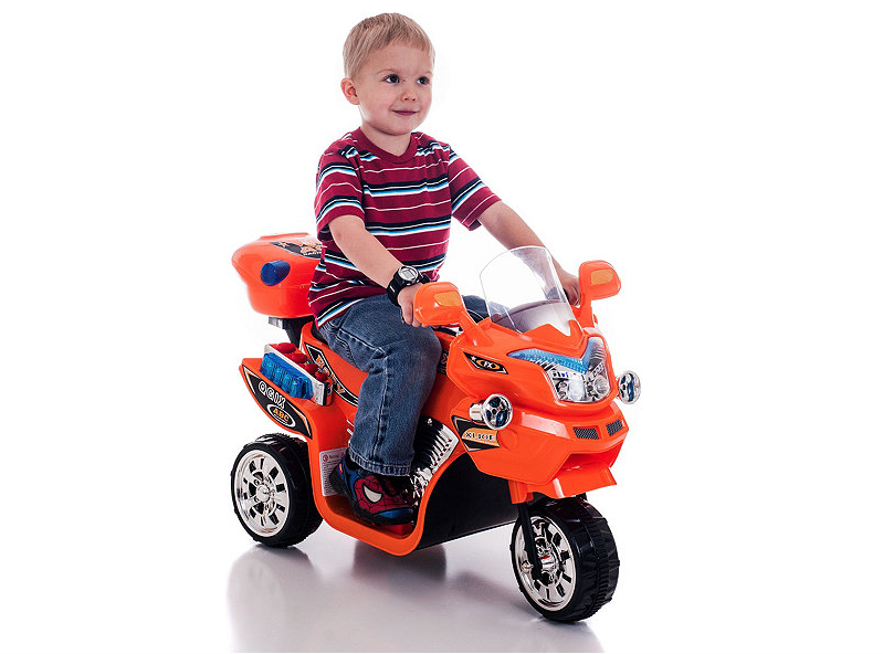 lot 51 image: Lil Rider FX 6V 3-Wheeled Ride-On Orange