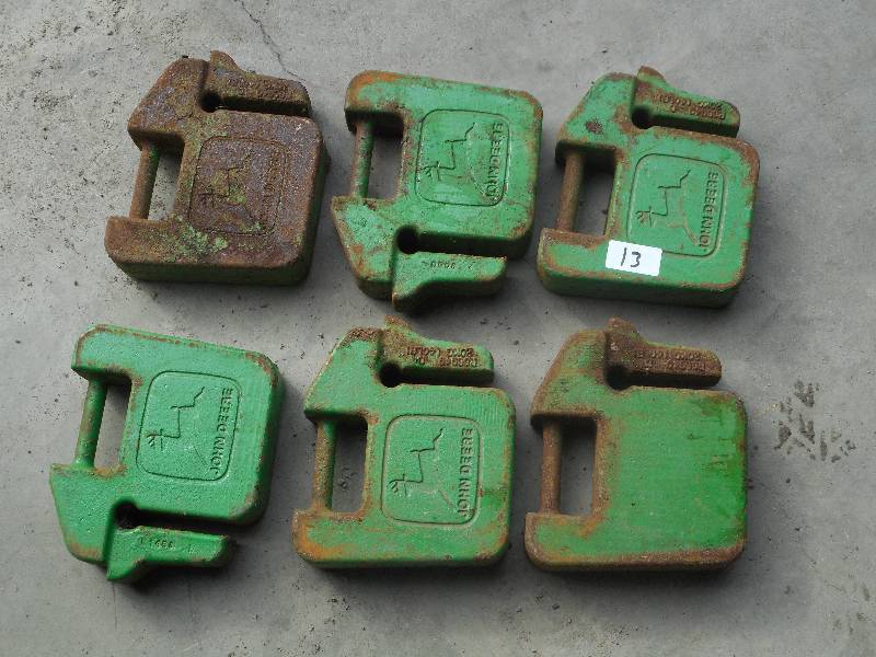 lot 13 image: (6) John Deere 40# Weights ...