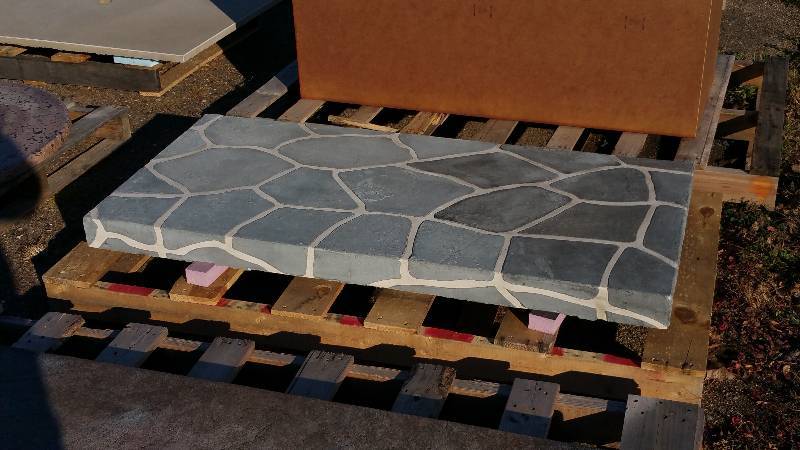 Blue, Gray, and White Cobblestone Polished Dyed Concrete Top