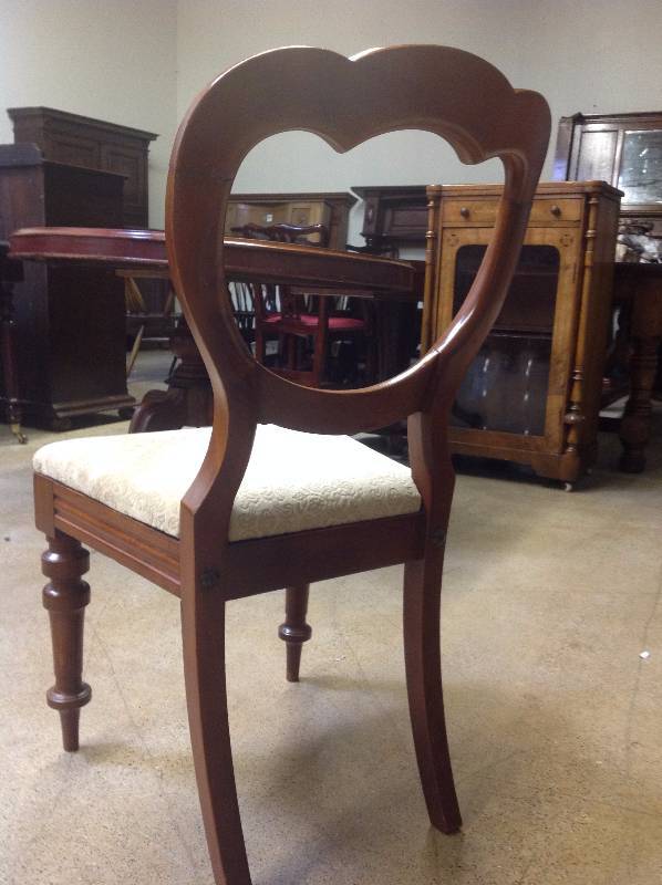 Four English Mahogany Balloon Back Chairs