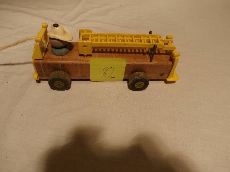 lot 82 image: Vintage Wood Ladder Truck wFigurine Driving