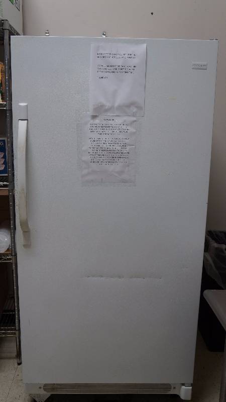 White Frigidaire Refrigerator on Wheels