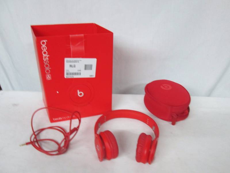 lot 16 image: Beats by Dr. Dre Solo Headphones Drenched in Red