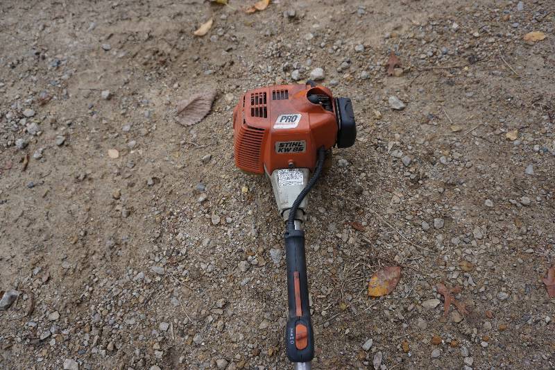 lot 12 image: Stihl Brand Model KW85 Gas Powered Broom