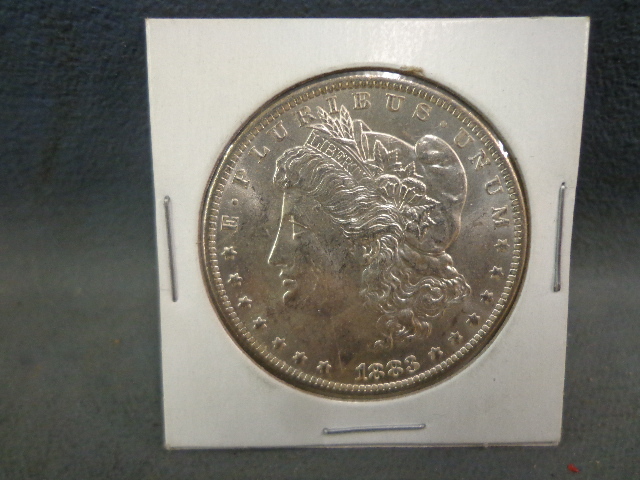 lot 56 image: Morgan silver dollar