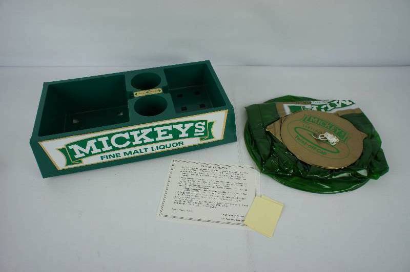 lot 4 image: Mickeys Bar Caddy & Inflatable Bottle