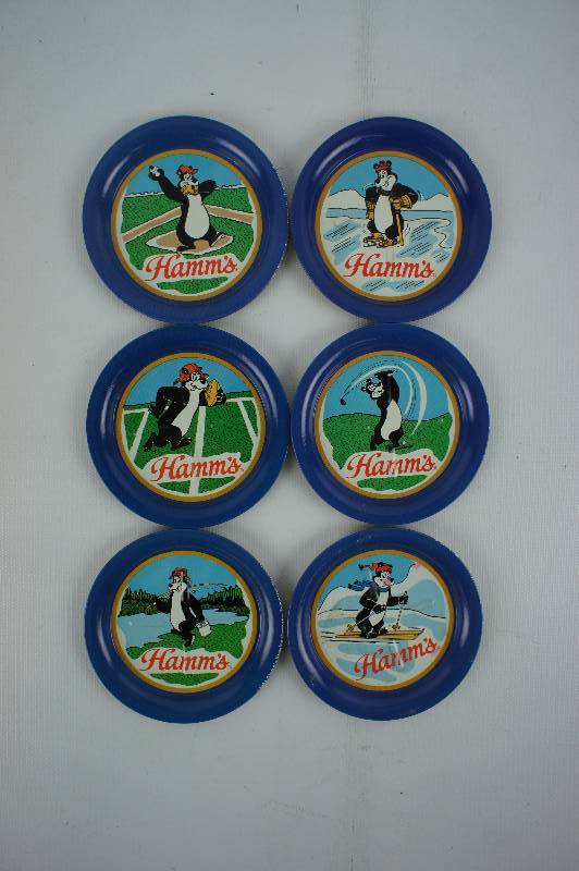 lot 55 image: Hamms Coasters With Bear Playing Sports