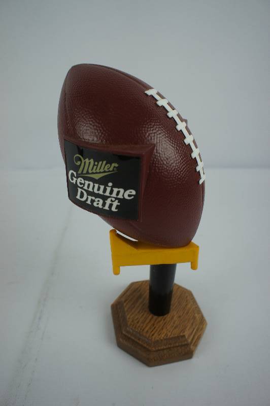 lot 73 image: Miller Genuine Draft Football Tap Knob